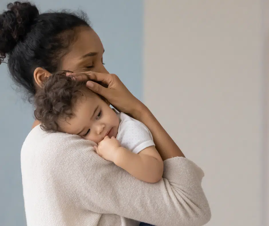 woman holding baby