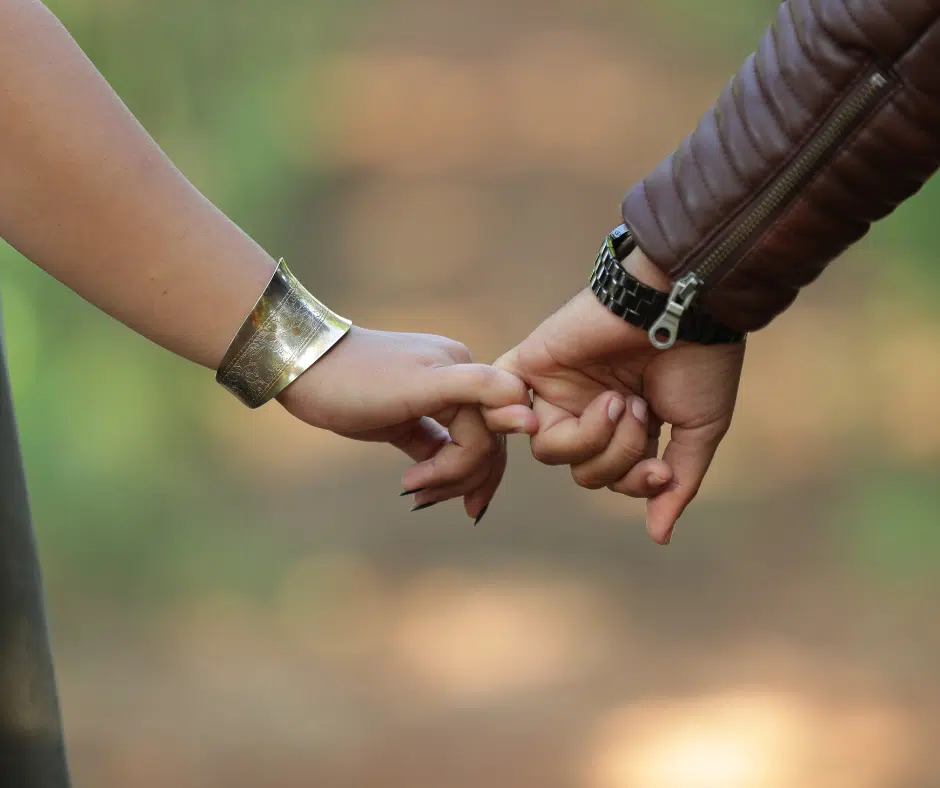 couple holding hands